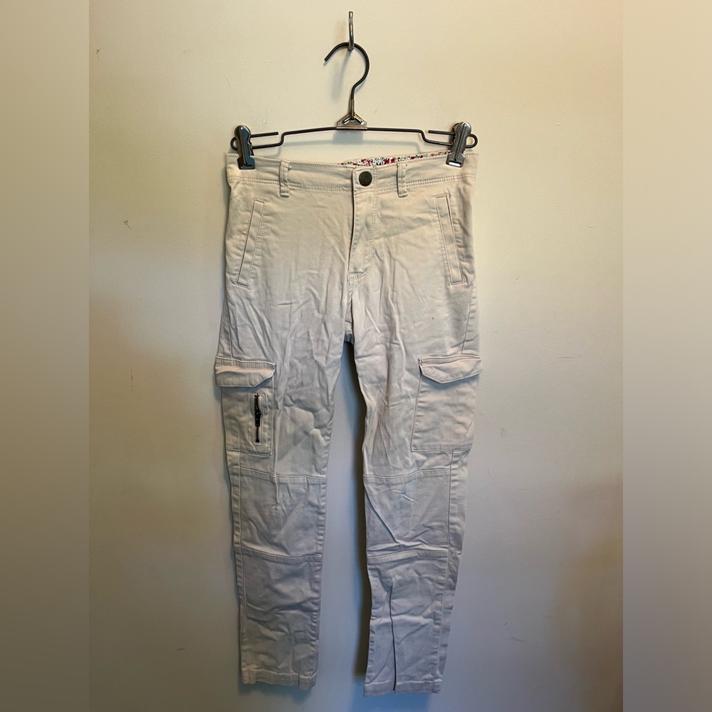 GAP, girls youth cream colored cargo pants with pockets and snap buttons.